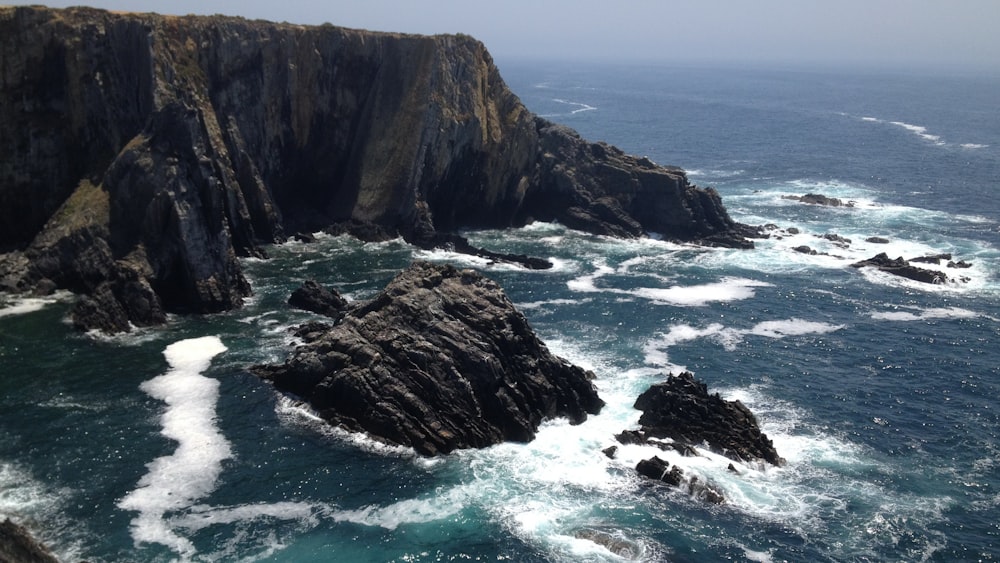 rock formations in body of water