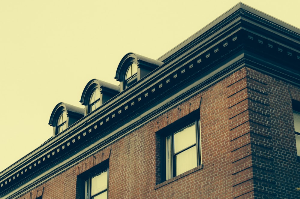 photo of black and brown brick concrete building