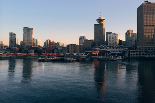 high-rise building beside body of water in Stanley Park Canada