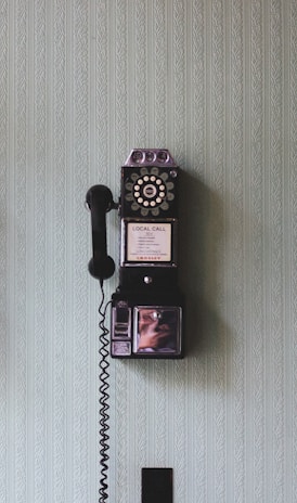 minimalist photography of three crank phones