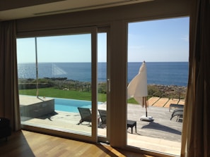 View from hotel window showing garden and pool