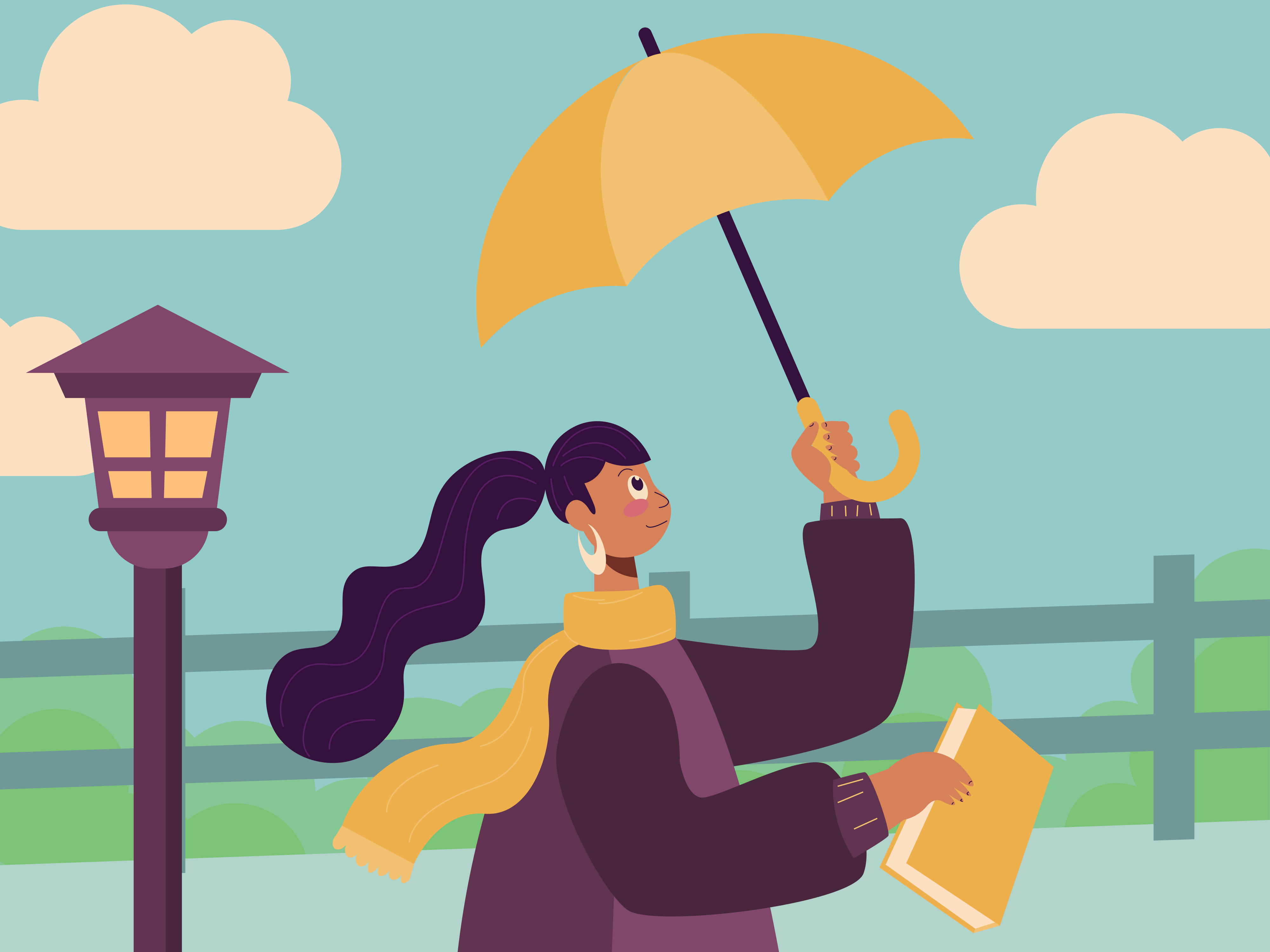 A woman walking down a street holding an umbrella