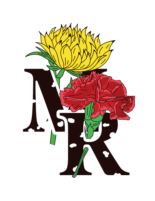 A bouquet of flowers sitting on top of the letter k