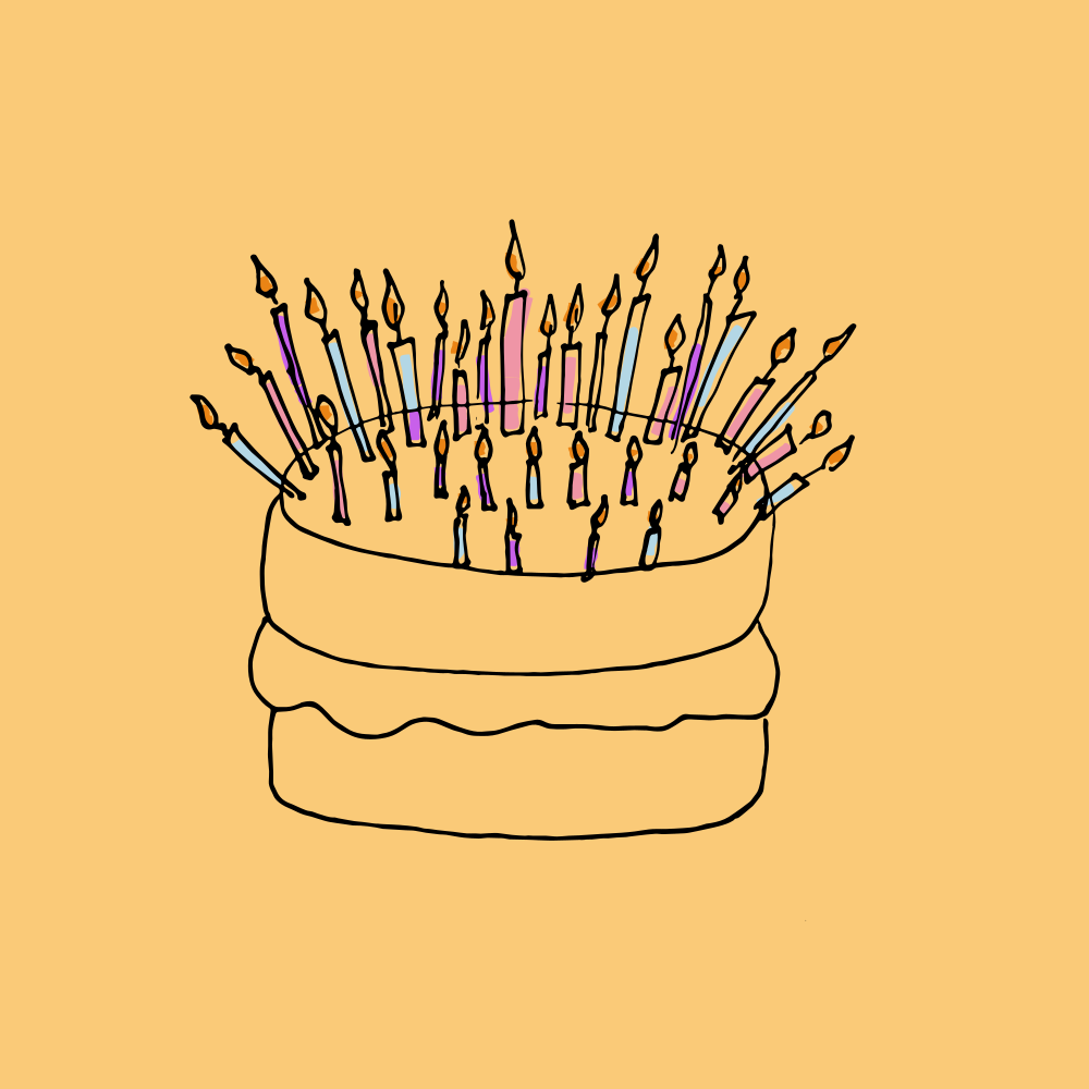 A cake covered in lit birthday candles.