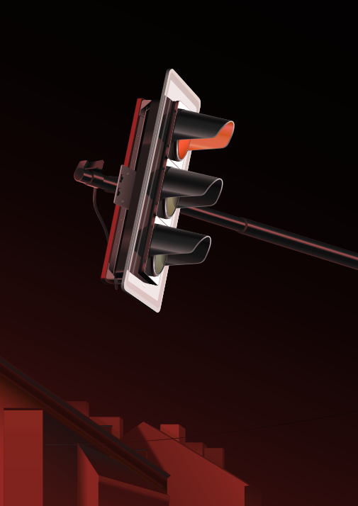 A traffic light glows against a dark background.