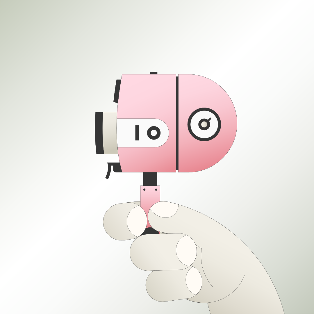 A hand holds up a pink, retro camera.