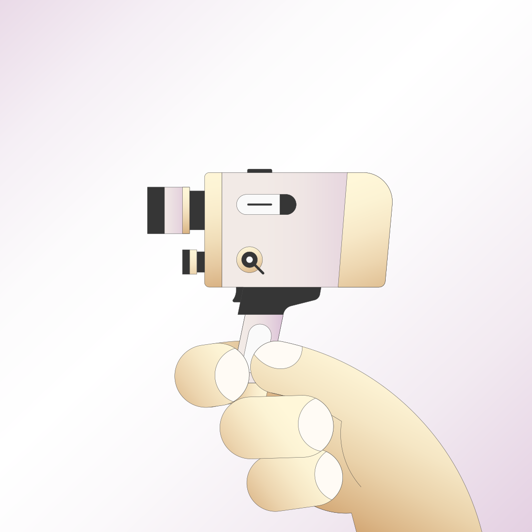 A hand holds a retro film camera.