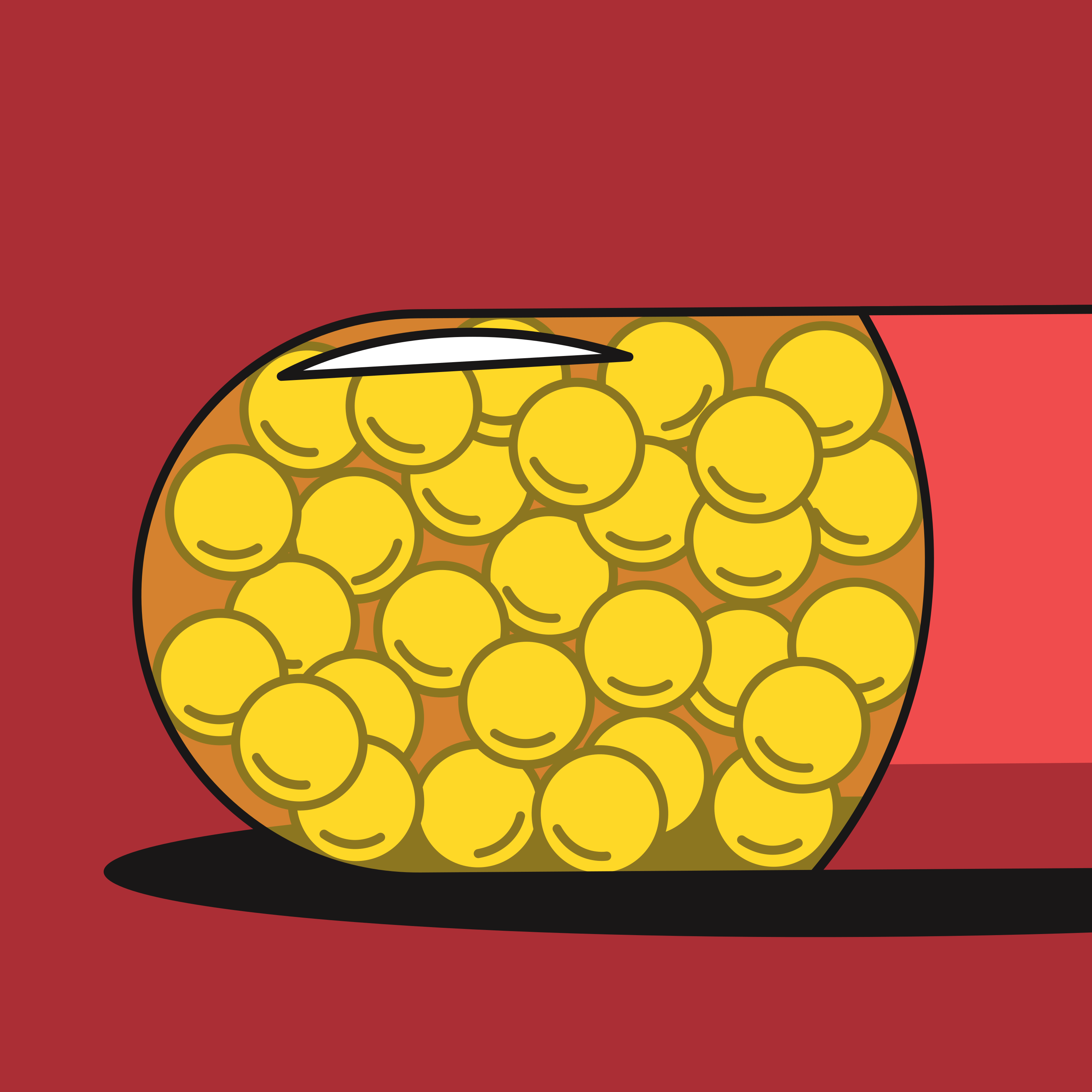 A capsule is filled with golden pellets.