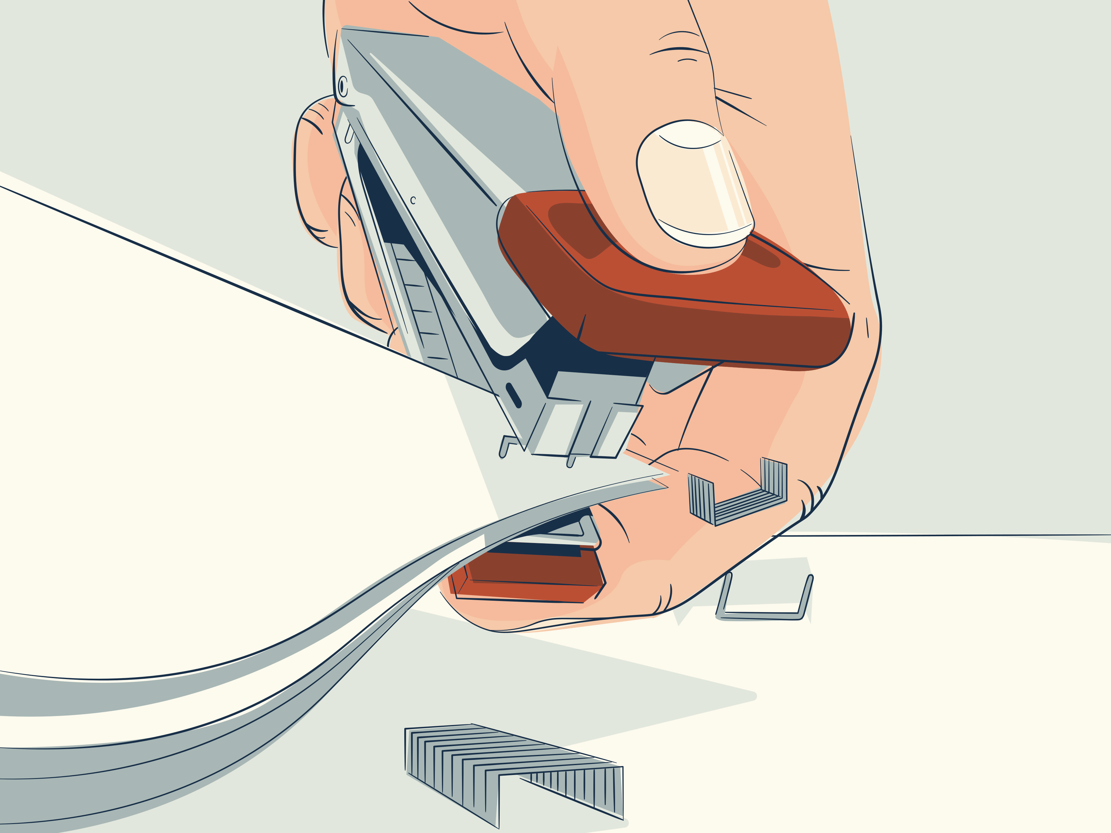 Hand stapling papers together with staples