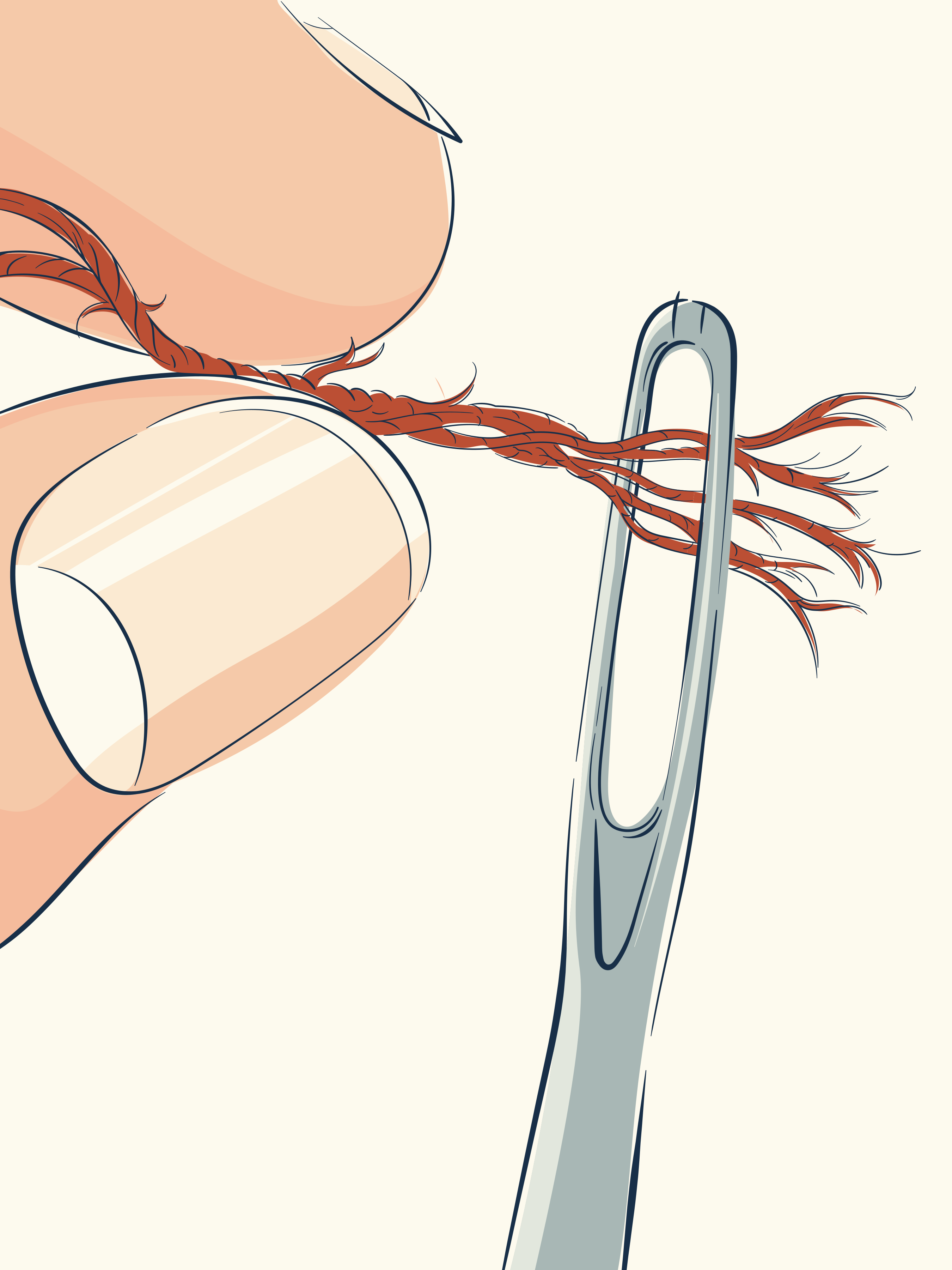 Fil effiloché passé à travers un œil d’aiguille