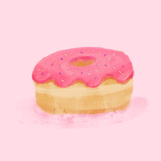 ピンクの背景にピンクのフロストドーナツ