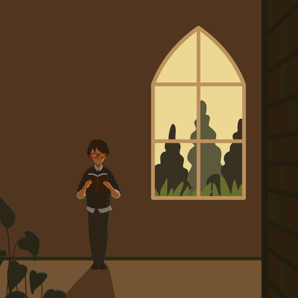 Un homme lisant un livre près d’une fenêtre