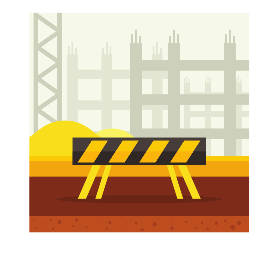 Construction site with hazard barrier and unfinished building