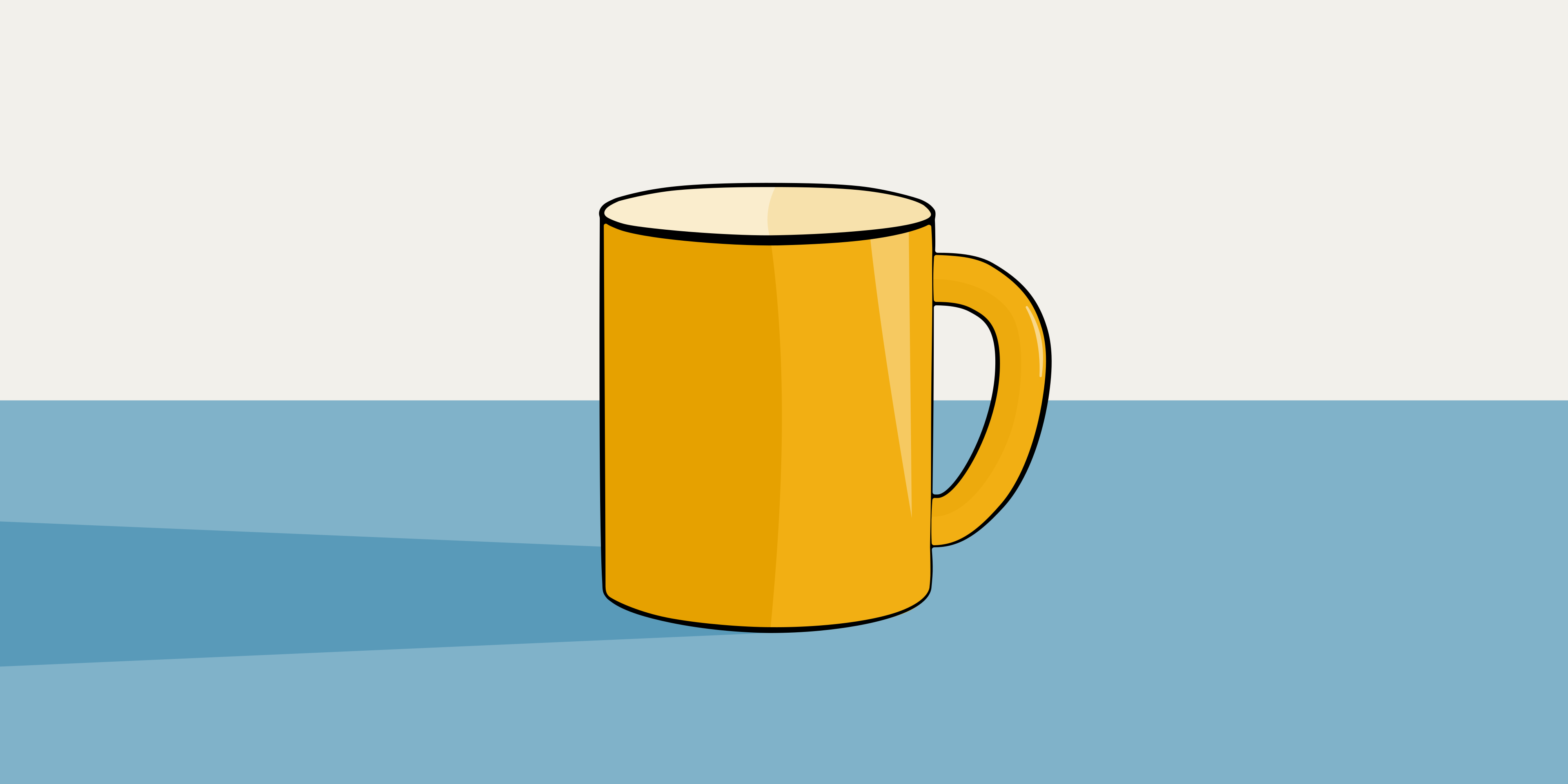 A simple yellow mug on a blue surface