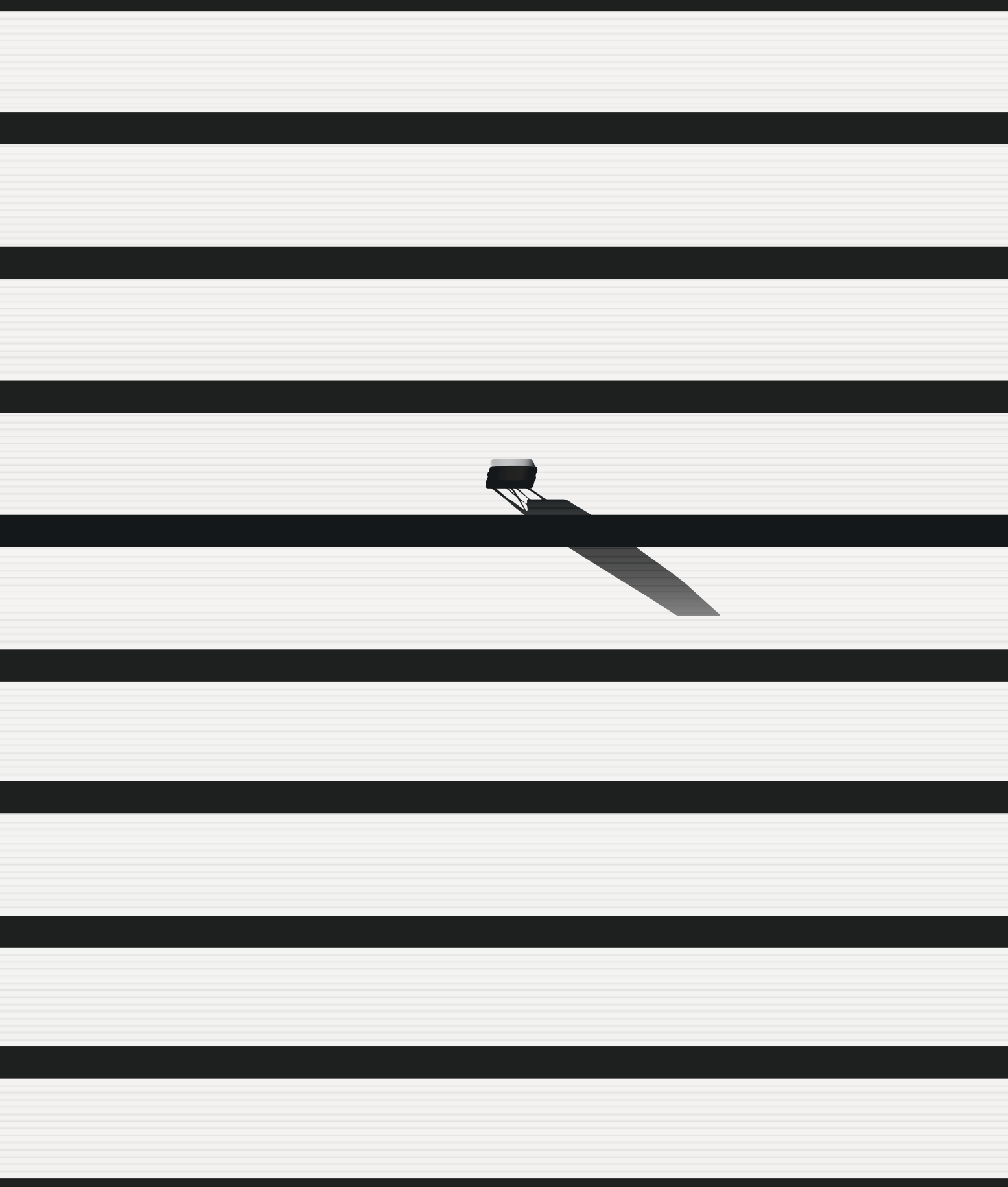 Shadow of a small object on horizontal white lines