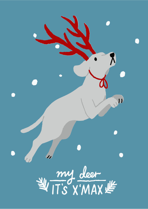 A dog with antlers jumping in the snow