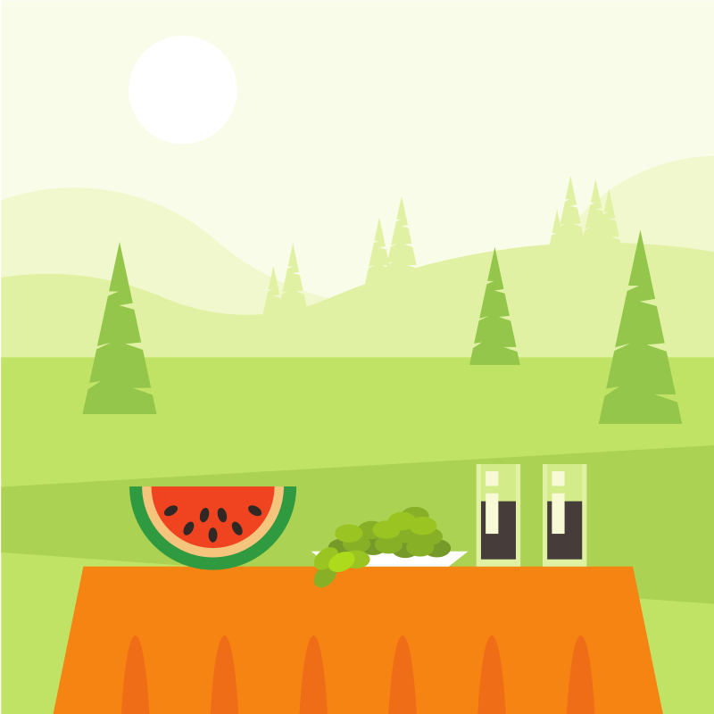 Picnic with watermelon, grapes, and drinks outdoors.