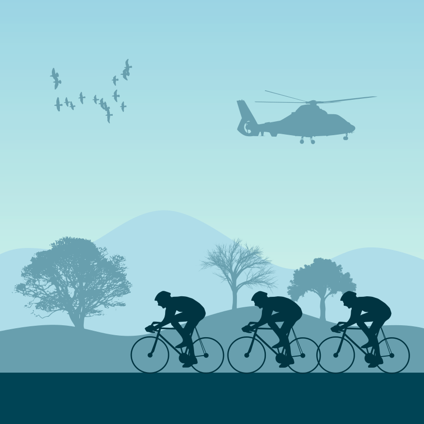 Radfahrer rasen mit Hubschraubern an Bäumen vorbei