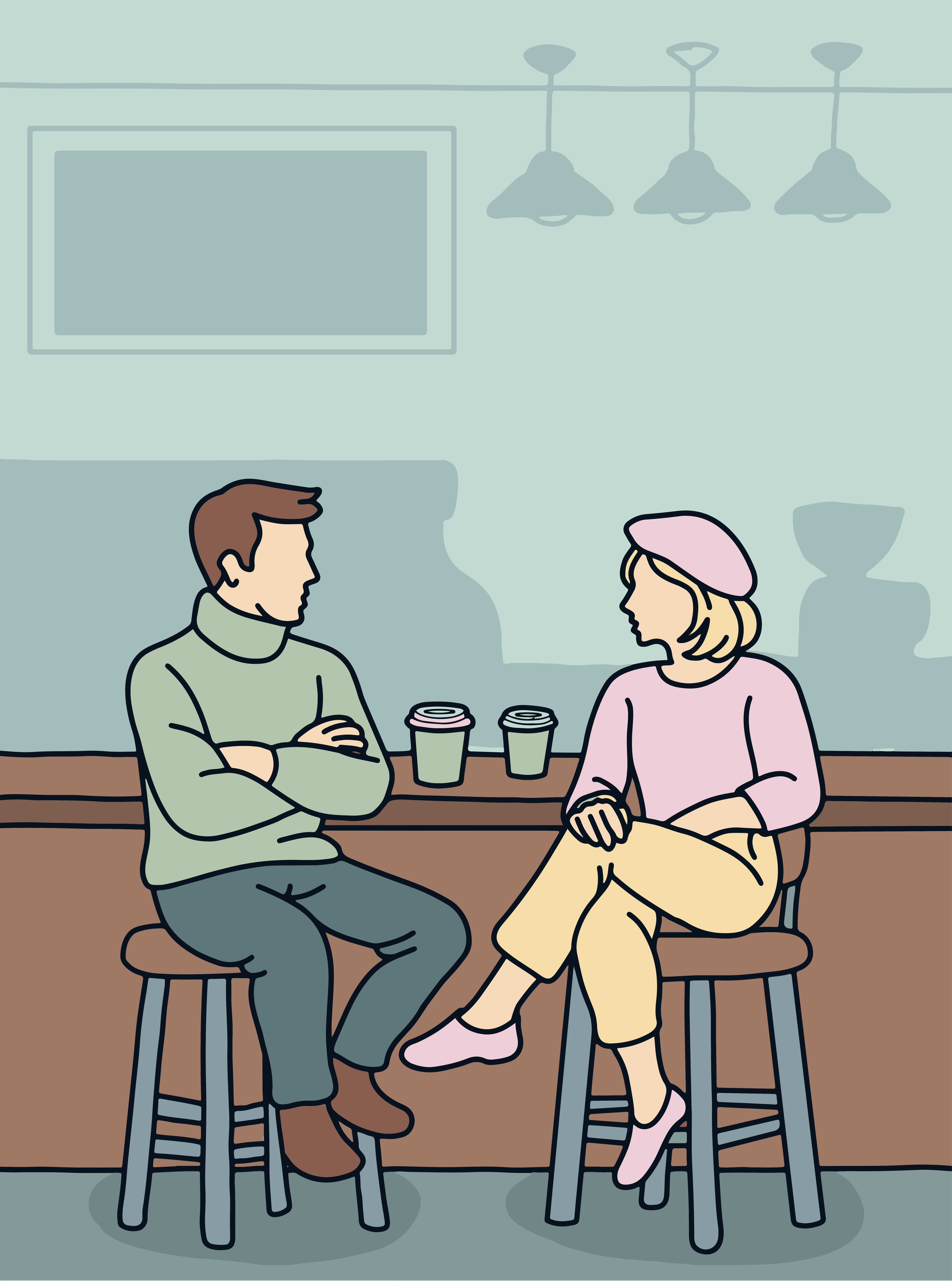 Two people talking at a counter