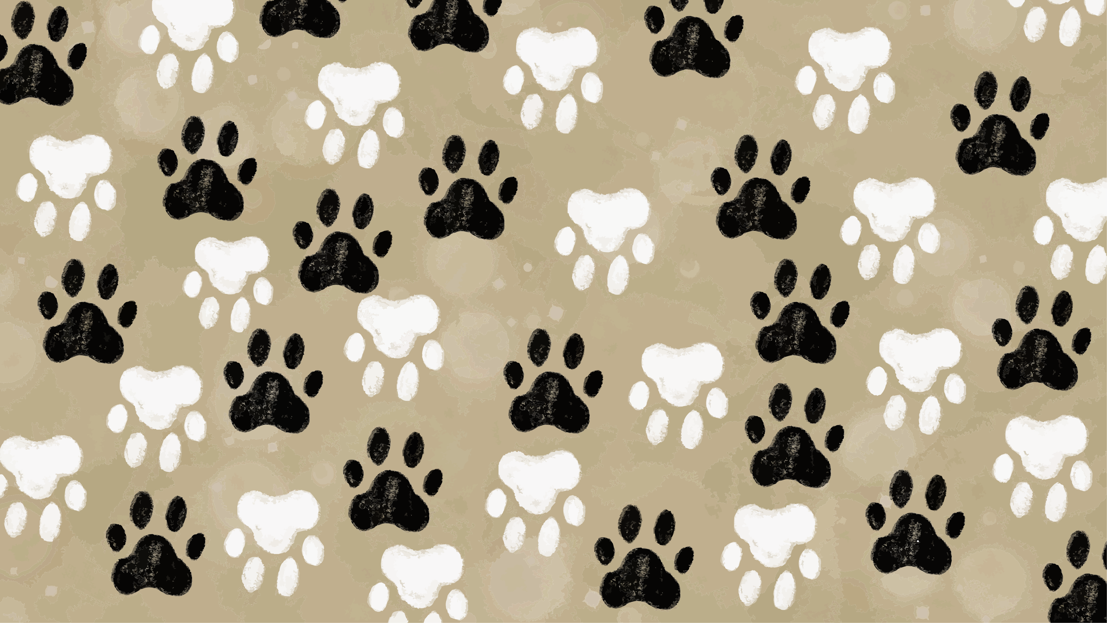 Un patrón de huellas de patas en blanco y negro.