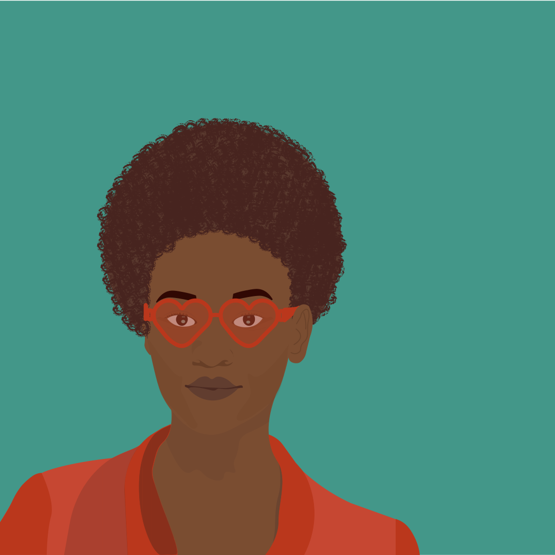Woman with heart-shaped glasses and curly hair