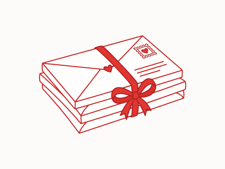 Pila de cartas atadas con una cinta roja