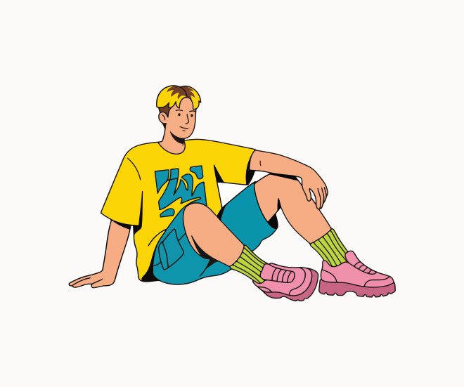 Um jovem de camisa amarela e shorts azuis está sentado.