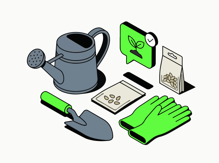 Gardening tools and seed packets arranged on a light background.