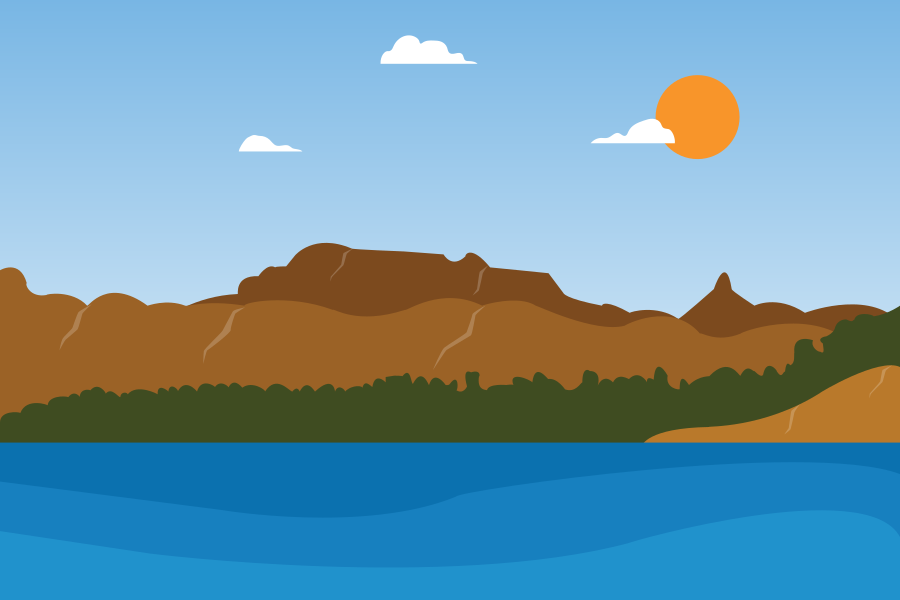 Giornata di sole su un vasto lago blu e montagne