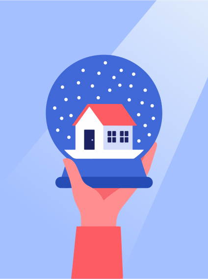 Hand holding a snow globe with a house inside.