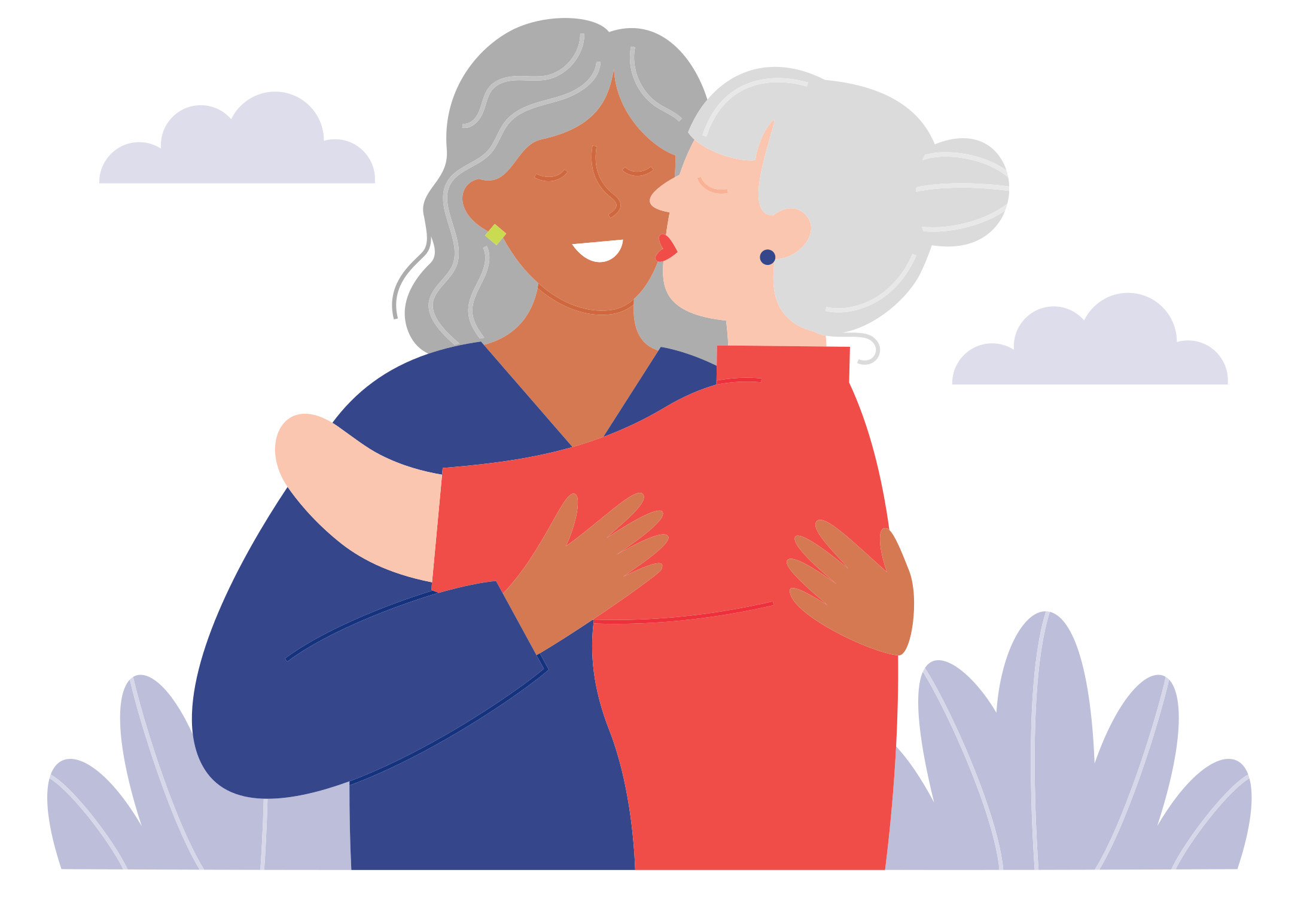 Two women hugging with a warm embrace.