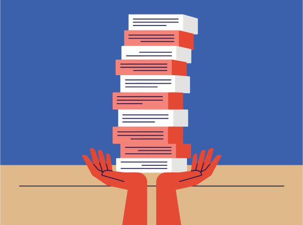 Hands holding a tall stack of books
