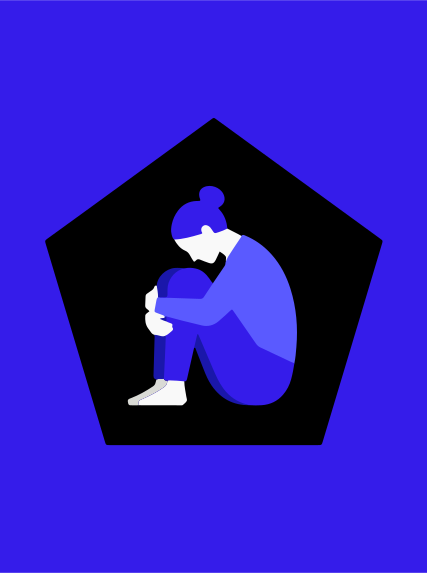 Woman curled up in a dark pentagon shape.