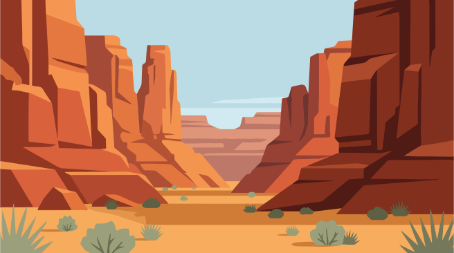 Desert canyon landscape with mesas and sparse vegetation.