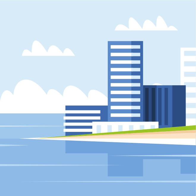 Modern buildings on a coastline with calm water.