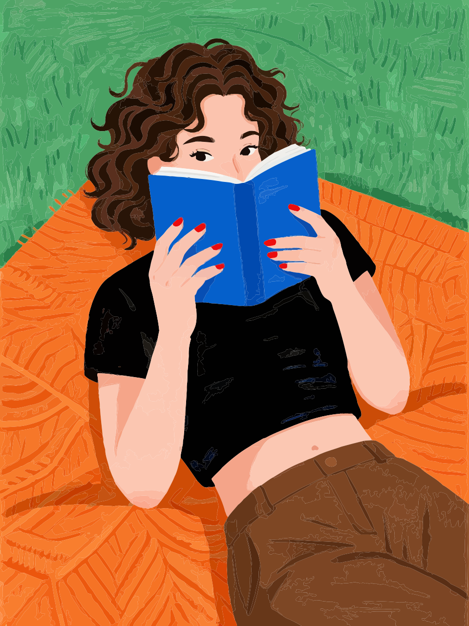 Woman reads blue book relaxing on orange blanket.