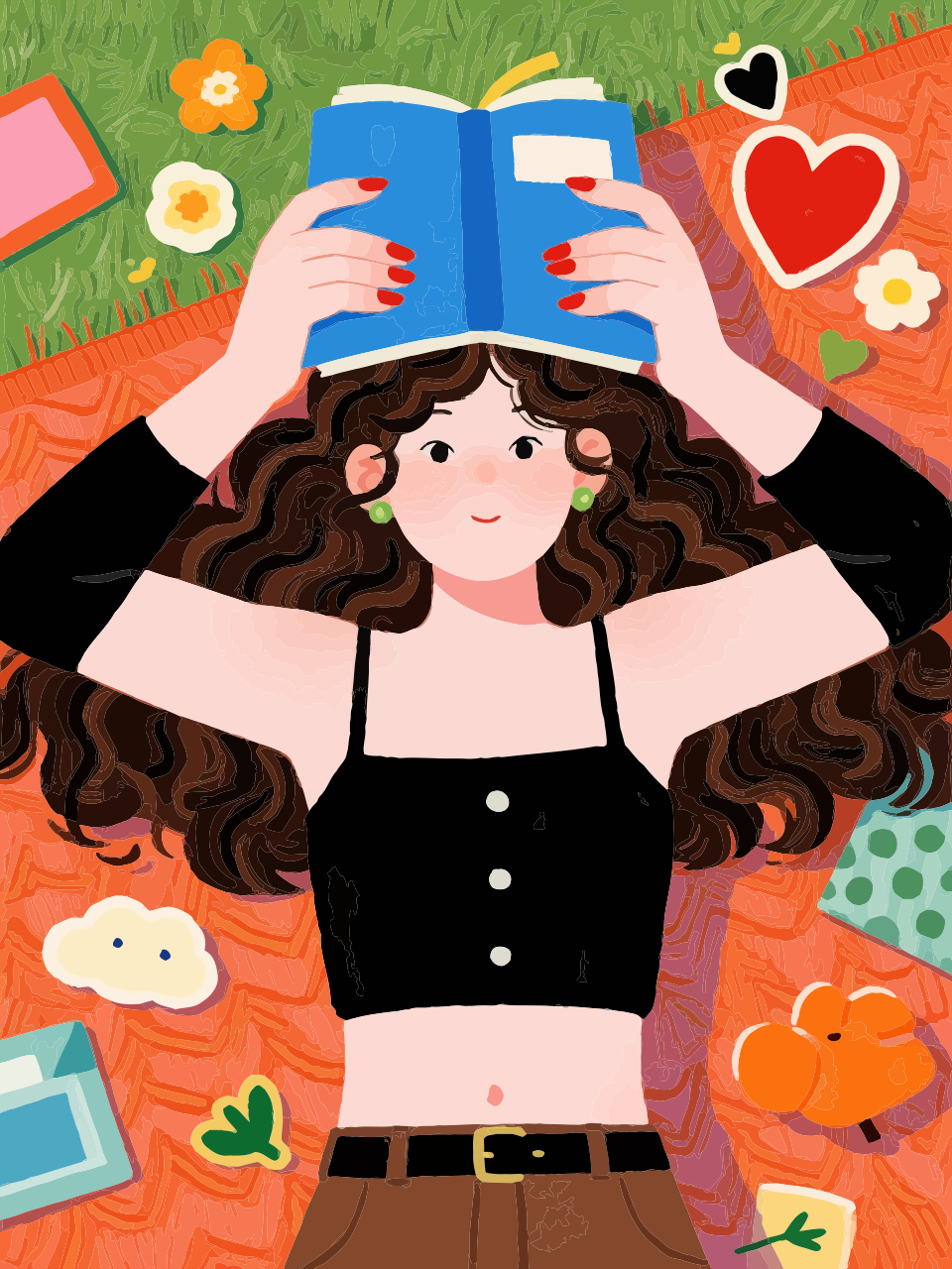 Woman relaxing on a blanket, reading a blue book.