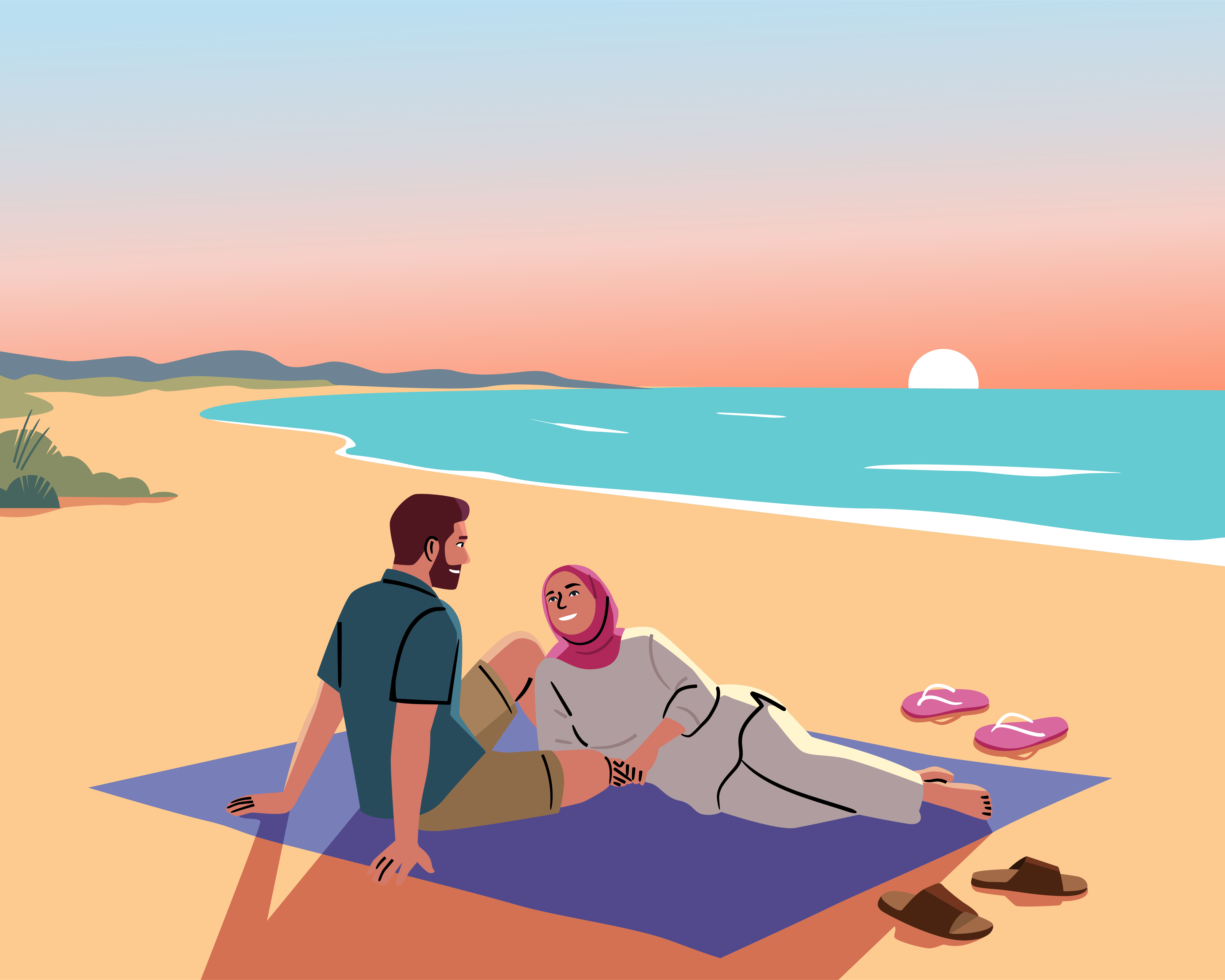 Pria dan wanita bersantai di pantai saat matahari terbenam.