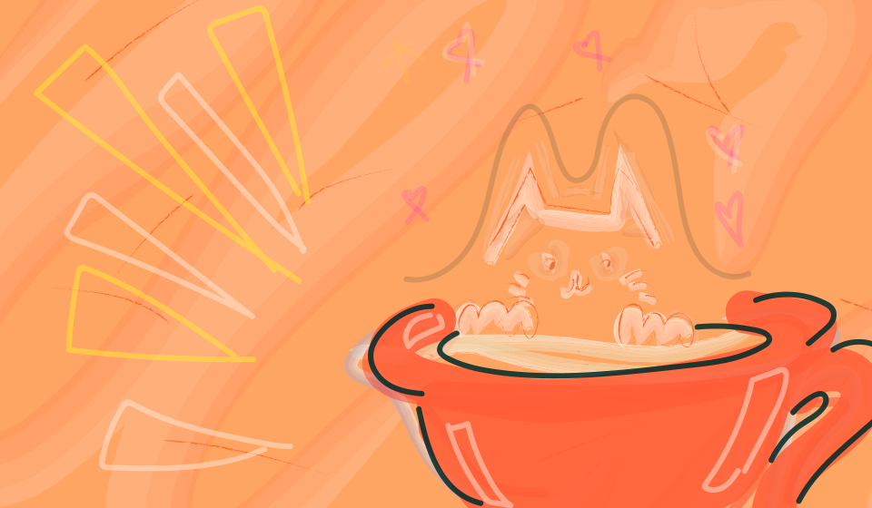 Chat rugissant dans une tasse rouge.