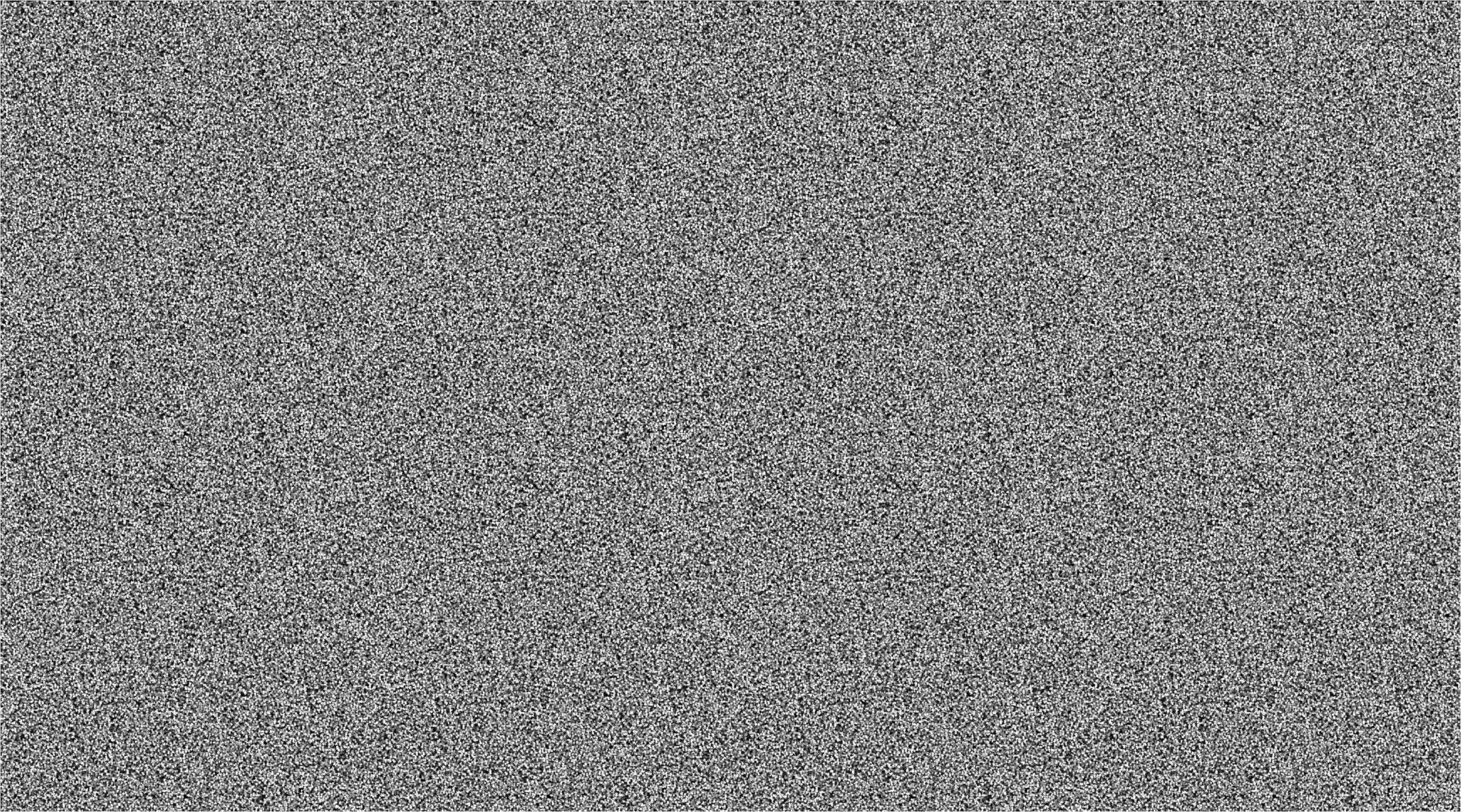細かい粒感のあるテクスチャのあるソリッドグレーの背景。