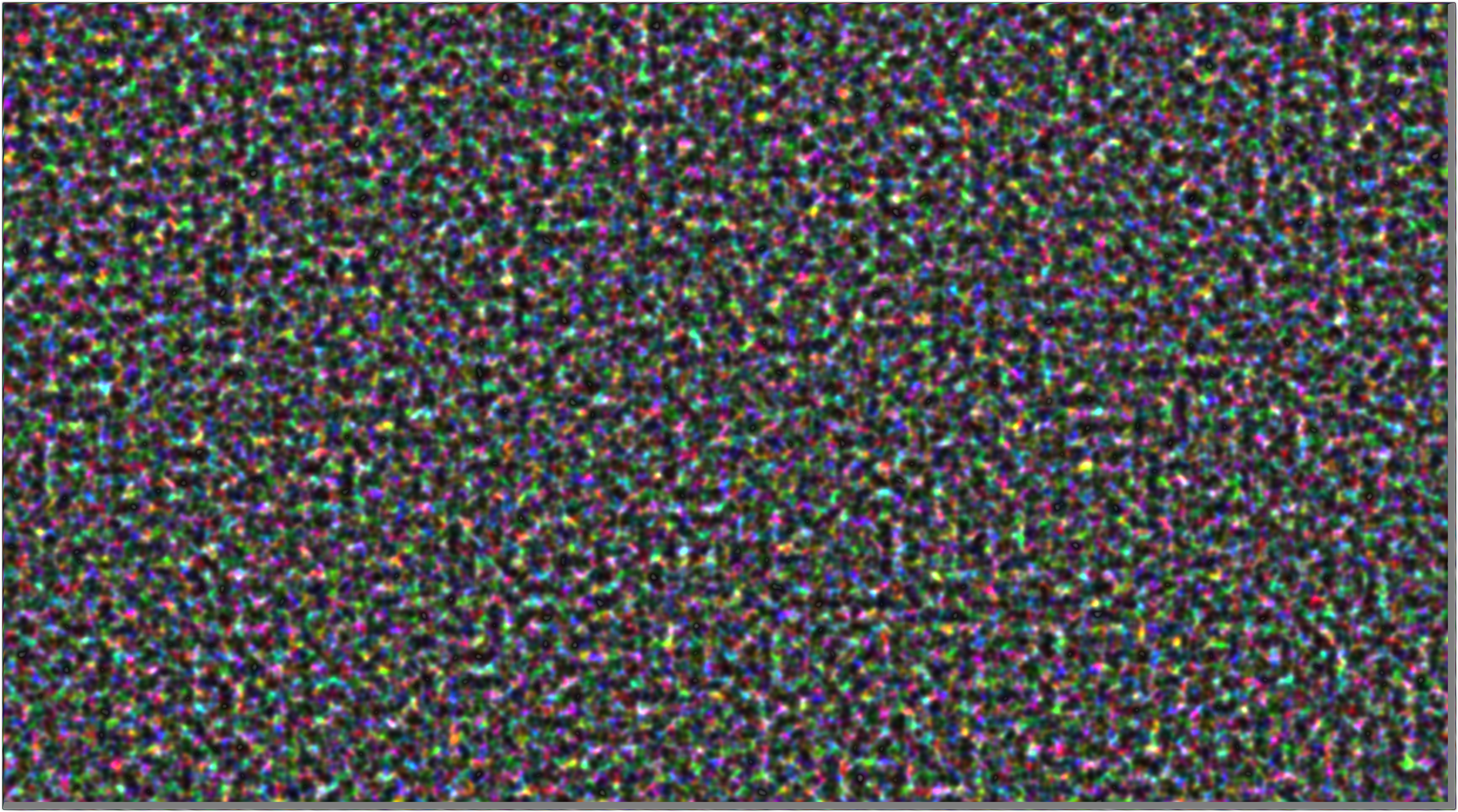Schermo digitale pieno di rumori casuali e colorati.
