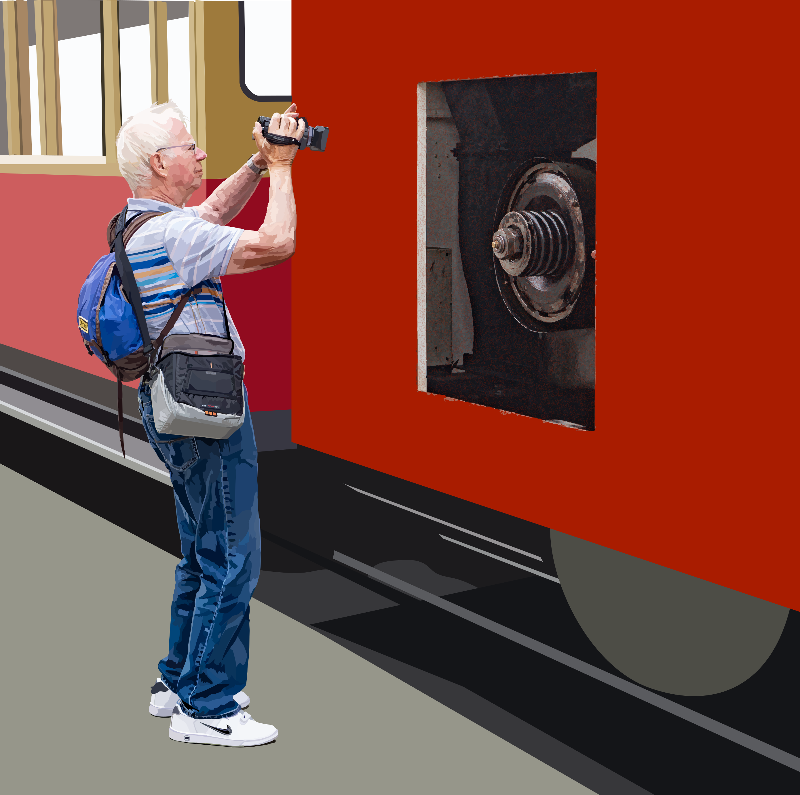 Ein Erwachsener filmt einen roten Zugwaggon mit einer Handkamera.