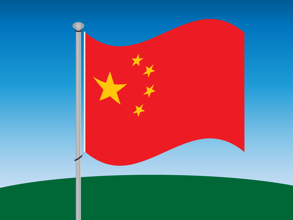 A bandeira nacional da China tremulando em um mastro contra um céu azul