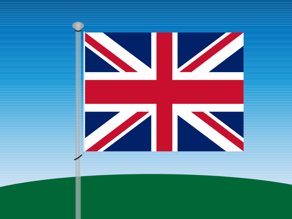 The Union Jack flag of the United Kingdom on a pole against blue sky
