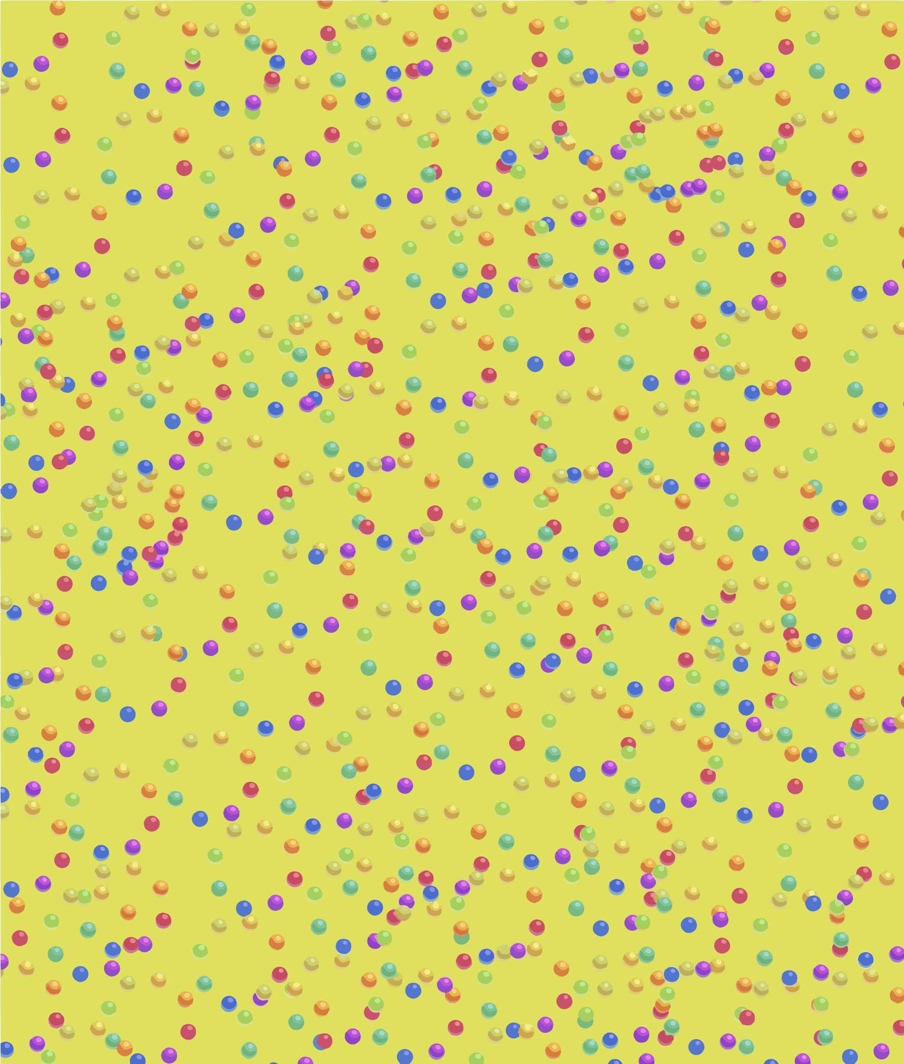 小さな多色の球体が単なる黄色の背景に散らばる模様