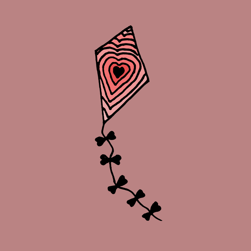 Un cerf-volant avec un motif de cœur rose et une queue noire sur fond mauve