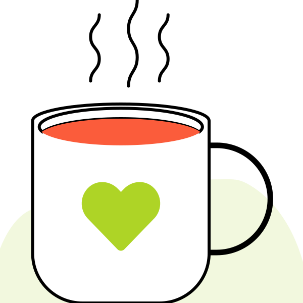 Una taza blanca con un icono de corazón verde que contiene un líquido rojo humeante