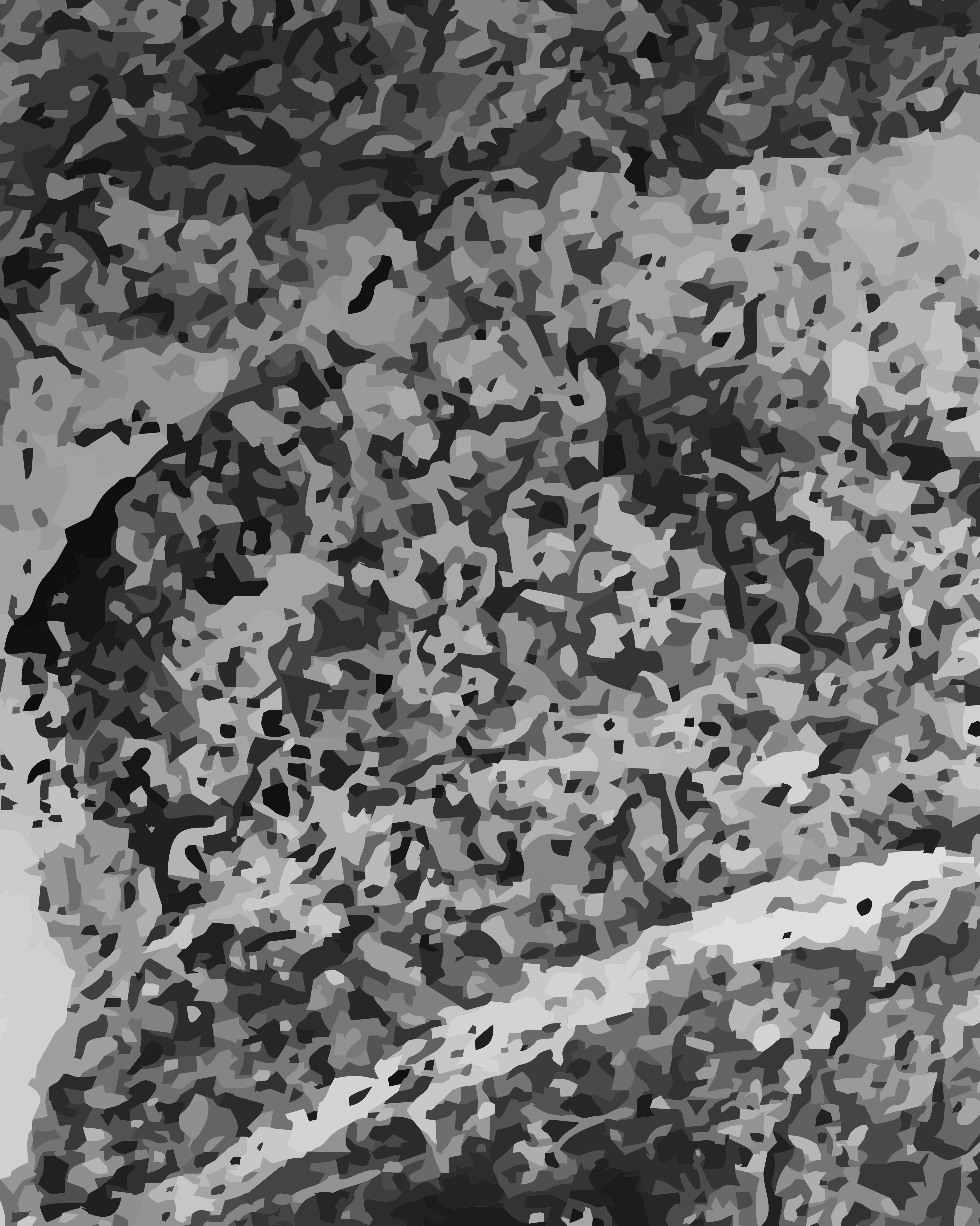 A textured surface of overlapping grey and black abstract shapes