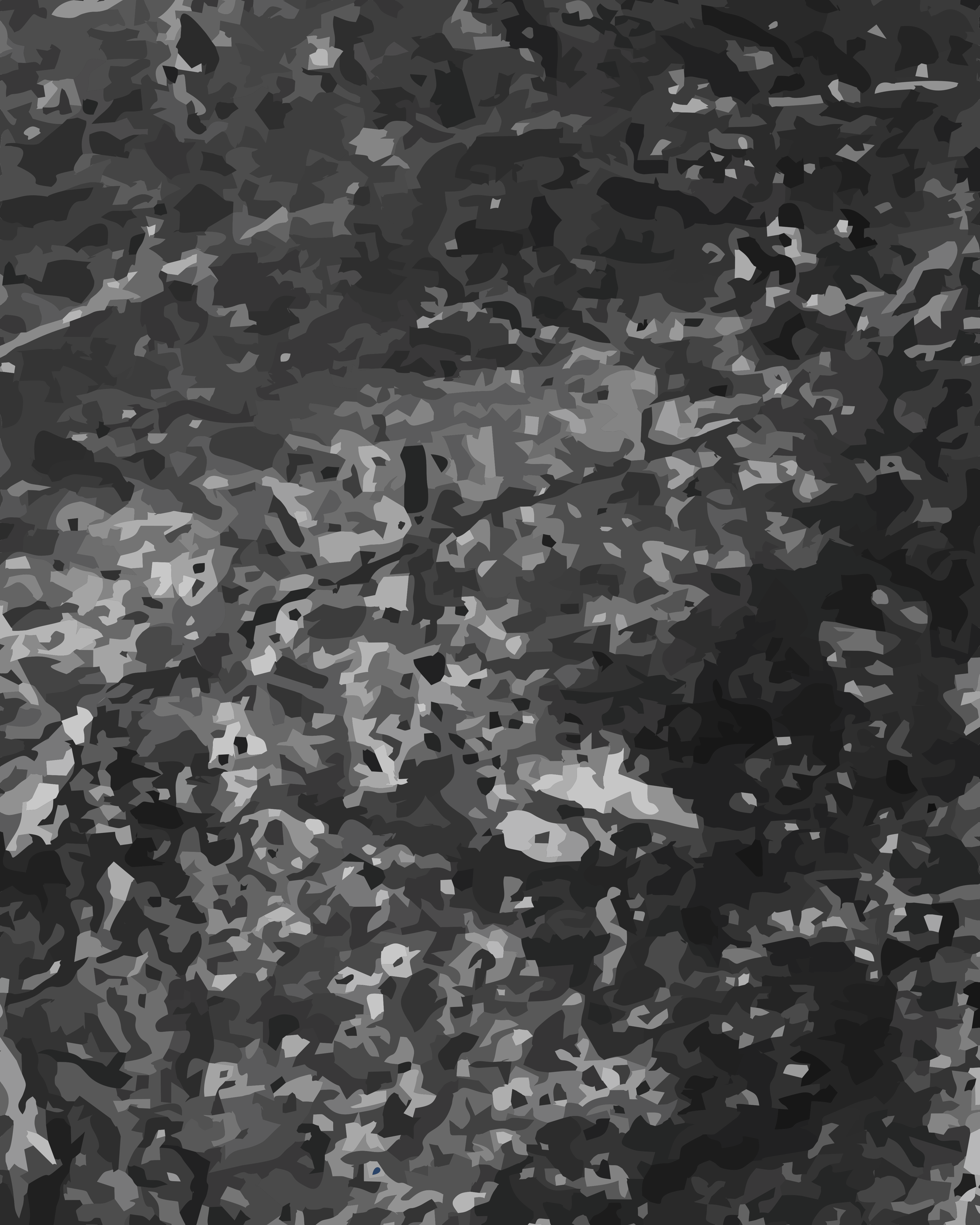A textured surface of overlapping grey and black abstract shapes