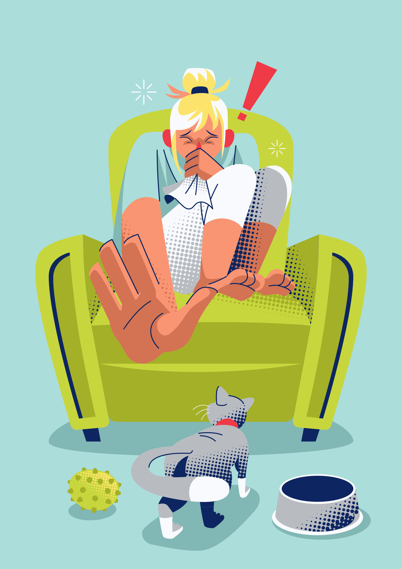 Une personne éternuant dans un mouchoir alors qu’elle est assise dans un fauteuil vert près d’un chat